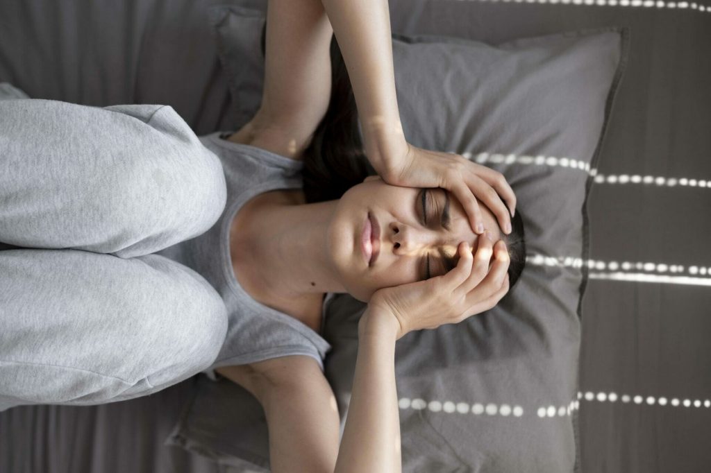 medium shot sad woman pillow
